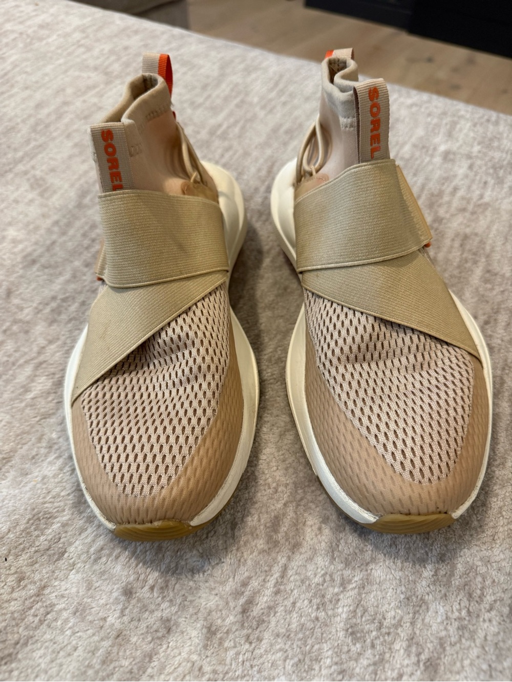 Sorel Woman’s Slip-On Athletic Sneakers in Beige with Elastic Cross Strap